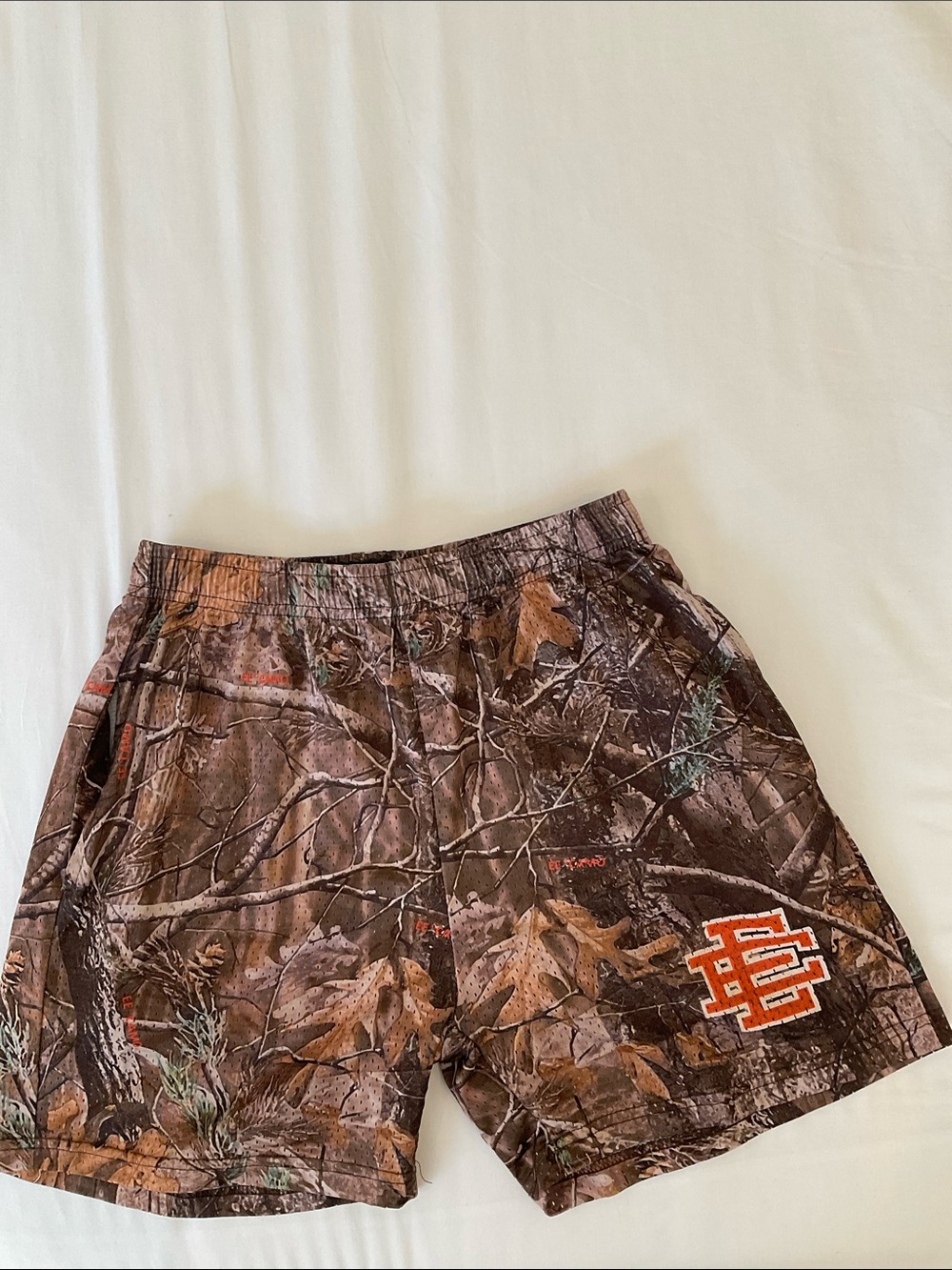 Camo Print Athletic Shorts with Orange Logo